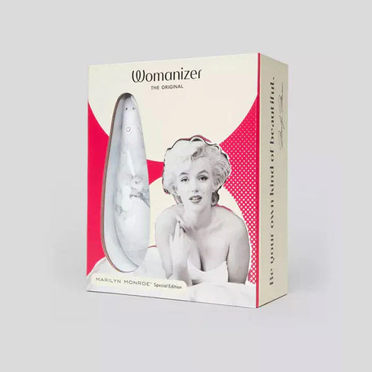 Marilyn Monroe By Womanizer, succionador de clítoris con tecnología Pleasure Air, 6 intensidades de succión y diseño ergonómico, ideal para una experiencia íntima placentera, recargable por USB.