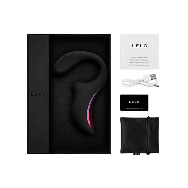 Contenido del paquete del vibrador Enigma™ de LELO, incluyendo el dispositivo, un cable de carga USB, una bolsa de almacenamiento de satén, manual de instrucciones y tarjeta de garantía, todo presentado en un elegante empaque negro